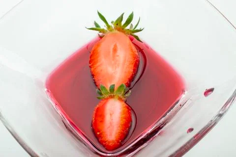 Two sliced strawberries Stock Photos