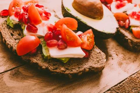 Two slices of bread with avocado. Stock Photos