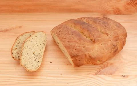Two slices of bread cut from a fresh loaf Stock Photos
