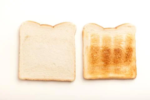 Two slices of bread, raw and toasted Stock Photos