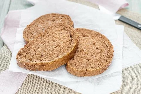 Two slices of brown bread Stock Photos