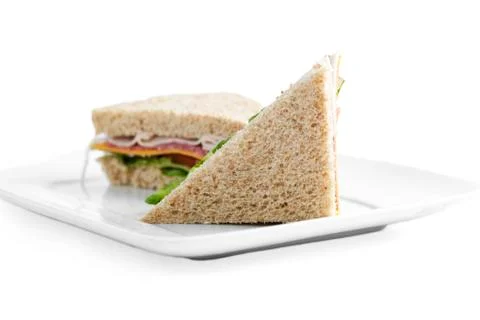 Two slices of ham and vegetable sandwich Stock Photos