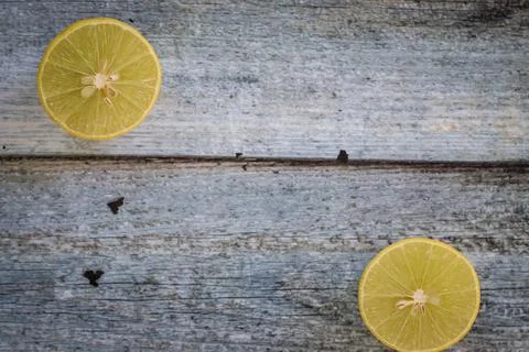 Two slices of sliced lemon Stock Photos