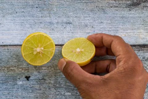 Two slices of sliced lemon Stock Photos