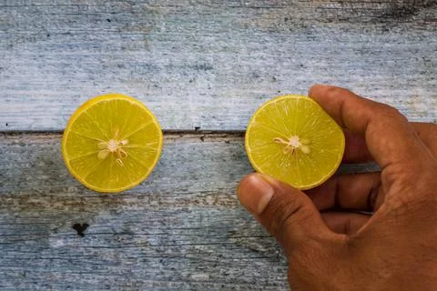 Two slices of sliced lemon Stock Photos