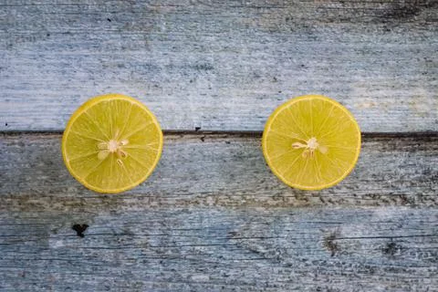 Two slices of sliced lemon Stock Photos