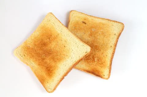 Two slices of toasted bread isolated on white Stock Photos