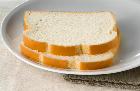 Two Slices of White Bread on a Plate Stock Photos