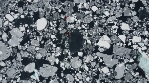 Two Small Boats Navigating Through Ice and Icebergs Near Perez Cape, Antarctica Video stock 326188807