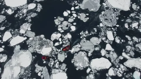 Two Small Boats Navigating Through Ice and Icebergs Near Perez Cape, Antarctica Stock-Footage 326188822