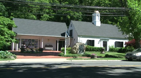 Two small buildings on main road Video stock 31900567