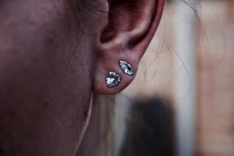 Two small earrings Stock Photos