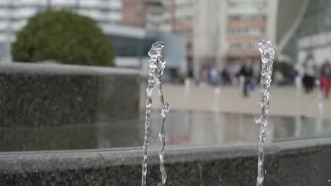 Two small fountains against the background of people walking Video stock 249045189