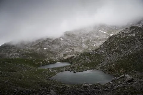 Two small lakes lay in the middle of the hills Stock Photos