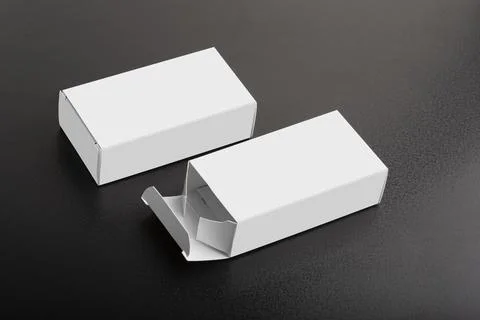Two small packages on dark background mock-up series Stock Photos
