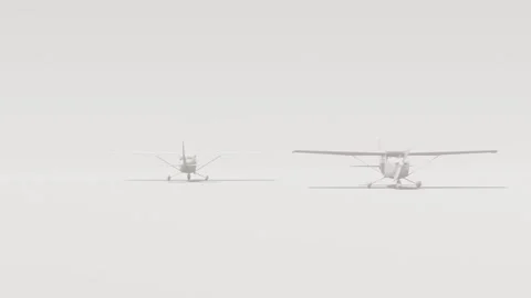 Two Small Propeller Planes Parked on Snowy Tarmac in Heavy Fog Stock Footage 330920238