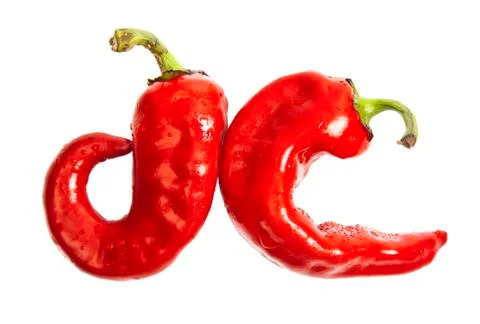 Two small red chilli peppers isolated on white Stock Photos