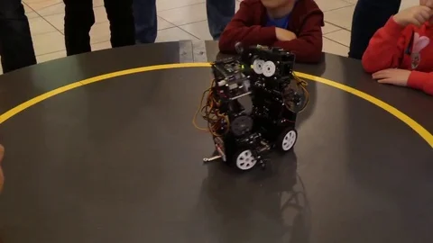 Two small robots fighting in the ring Stock Footage 69243965