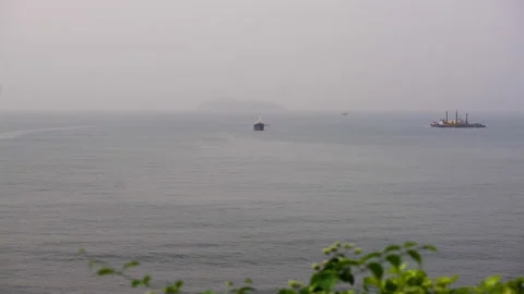 Two small ships off the coast of Cameroon, Africa Stock Footage 261141992