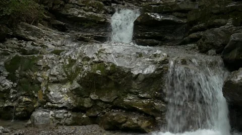 Two small waterfalls in river Stock Footage 56232404