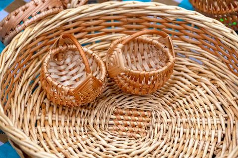 Two small wicker baskets and one large basket. Stock Photos