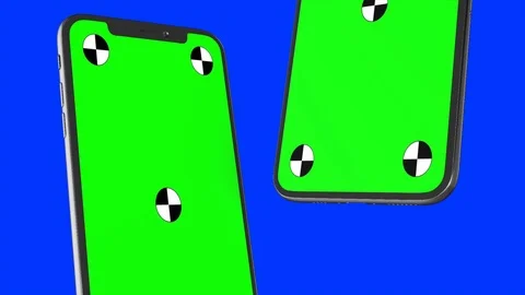 Two smartphones on blue background. Easy customizable green screen. Computer Video stock 125239077