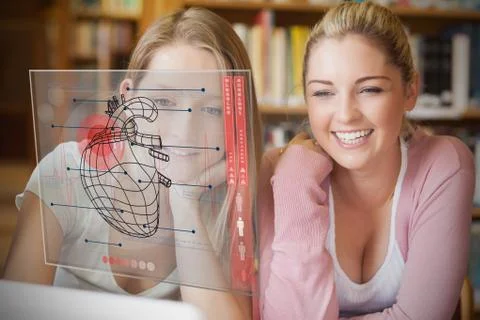Two smiling students looking at laptop and futuristic interface with heart Stock Illustration