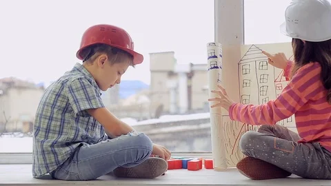 Two smiling young Builder planning the construction work Stock Footage 104847833