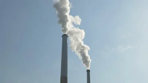 Two Smoking Chimneys (Zoom In) Stock-Footage 169228281