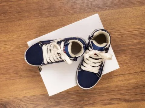 Two sneakers on the floor Stock Photos