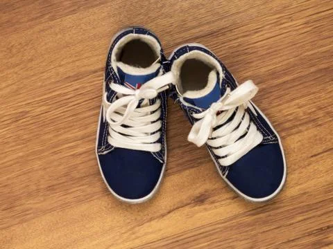 Two sneakers on the floor Stock Photos