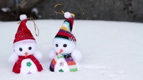 Two snowmen and snow winter Stock Footage 70488404