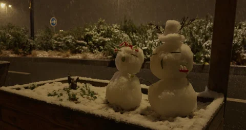 Two snowmen in love Stock Footage 325532834