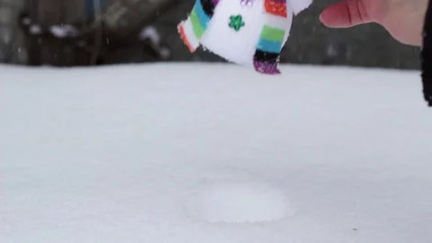 Two snowmen in snow Stock Footage 70424865