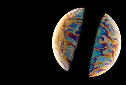 Two soap bubbles in the shape of a ball. Stock Photos