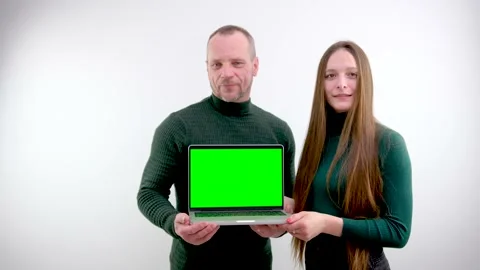 Two software developers analyzing source code looking at green screen chroma key Stock Footage 234726429