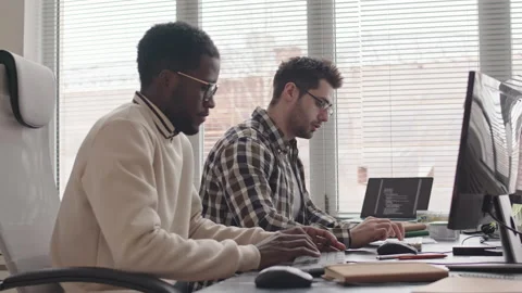 Two Software Developers Concentrated on Work Stock Footage 165214311