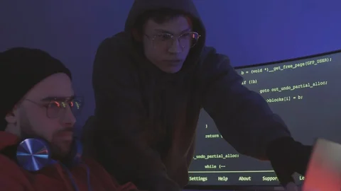 Two Software Developers Developing Program Code Stock Footage 129813605