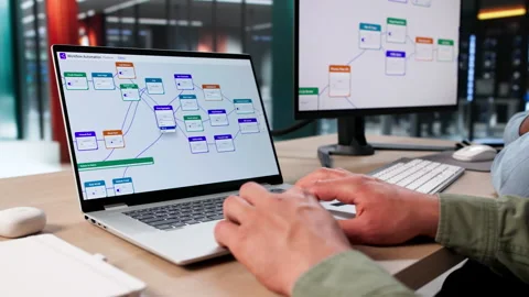 Two Software Engineers Discussing Automated Workflow System Stock Footage 336370296