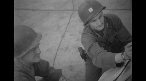 Two soldier reading a map Stock Footage 36419239