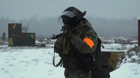Two soldiers with machine guns take aim Stock Footage 266102742