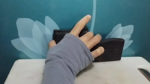 Two Solid Chocolate Bars on the Table, Only One is Picked Up Stock Footage 229304033