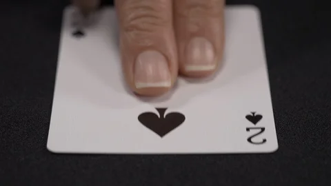 Two of Spades playing card, moving on a luxury black background 4k. Stock Footage 95574746