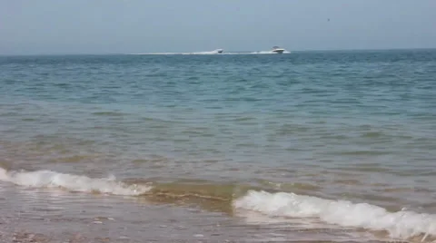Two speedboats pass Stock Footage 39296853
