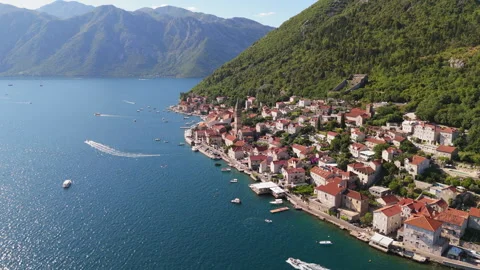 Two Speedboats Passing Perast Old Town, Bay of Kotor Aerial 4K 動画素材 342540121