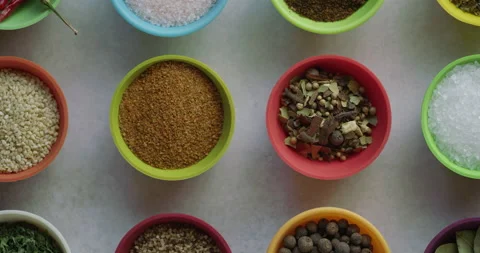 Two Spices Top Down in Colorful Cups Stock Footage 133964440