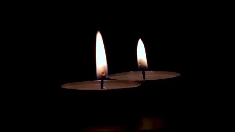 Two spinning candles Stock Footage 221140700