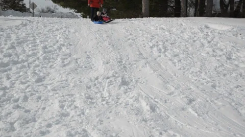 Two Spinning Sleds Stock Footage 37013920