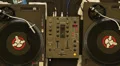 Two spinning turntables platters, nightclub DJ equipment working HD Footage