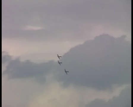 Two Spitfires and a Hurricane flying in formation - DV PAL Stock Footage 1044045